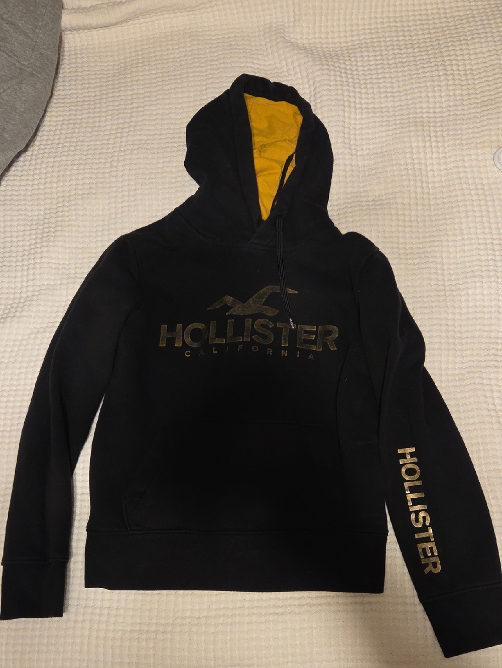 Hollister Black Hoodie with Gold Logo and Yellow Hood Lining